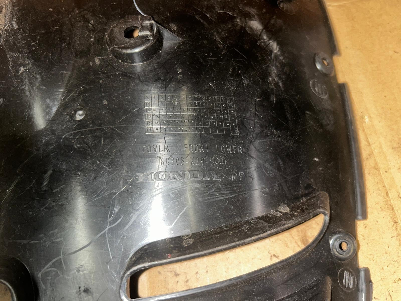 2014 Honda ANC 125 Front Lower Cover | 64308-K29-9001
