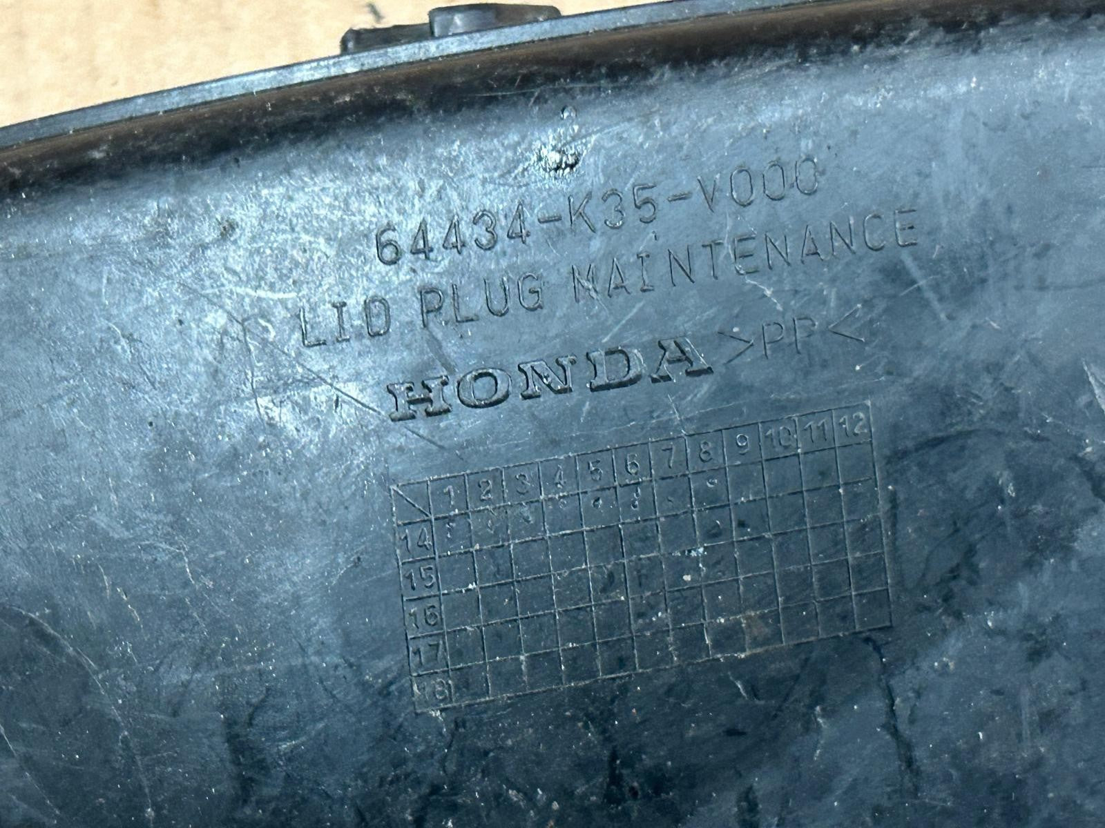 2015 Honda WW125 Plug Maintenance Lid | 64434-K35-V000