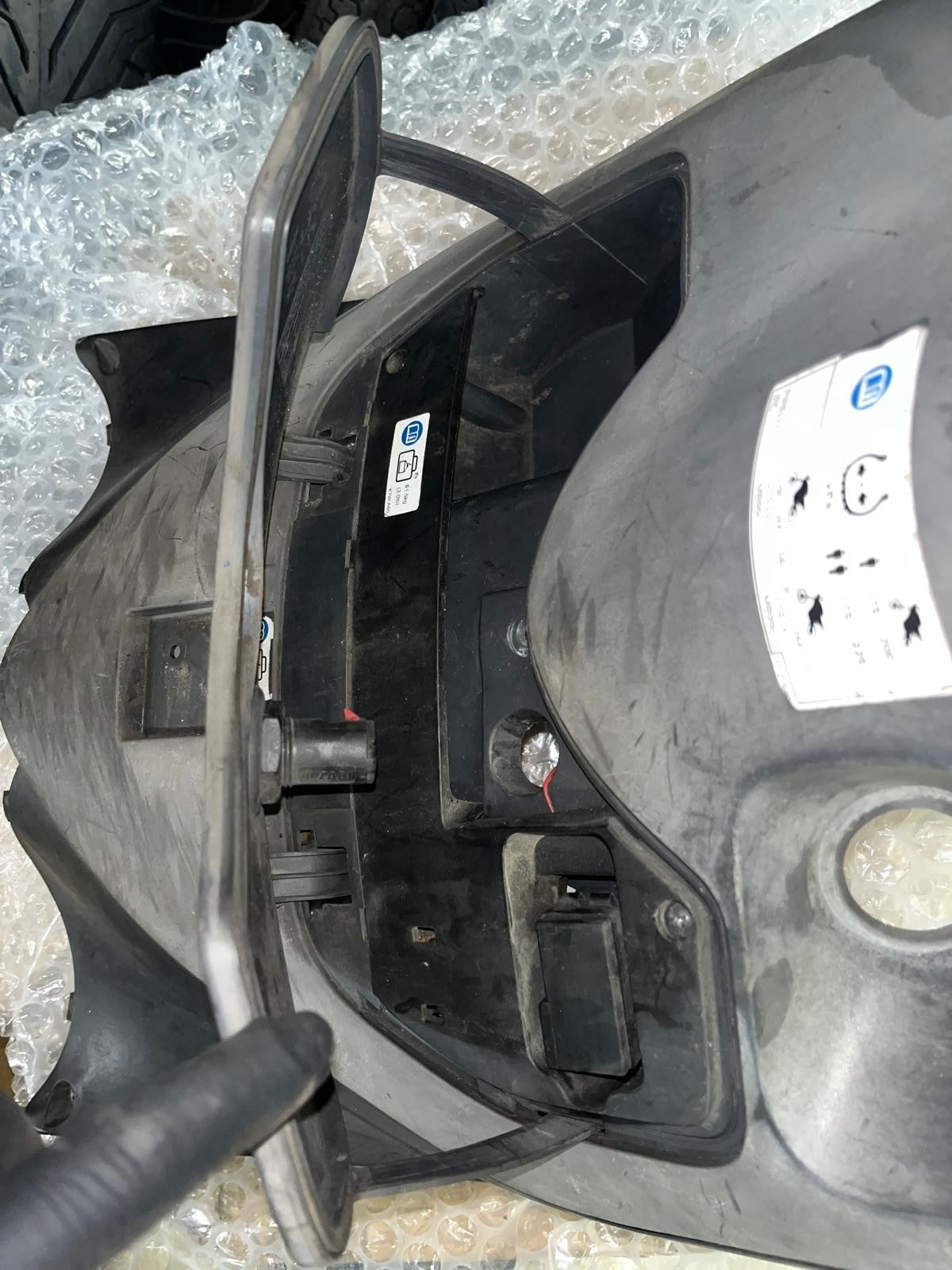 Honda PES 125 Inner Leg Shield Cover | 81131-KTZ