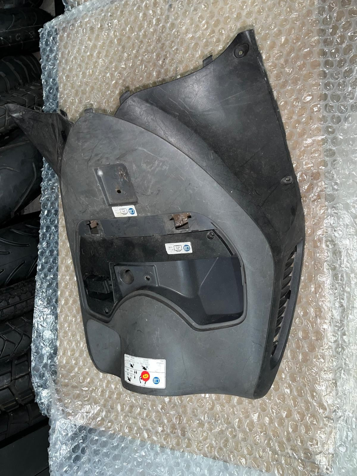 2006 - 2012 Honda PES 125 Upper Leg Shield | 81131-KTZ-D000