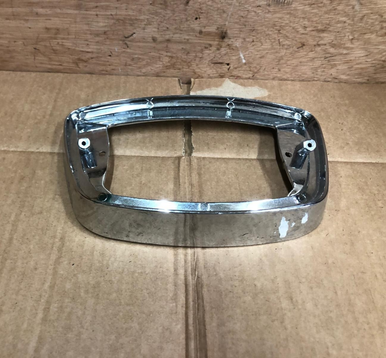 Vespa LX Rear Tail Light Frame Chrome