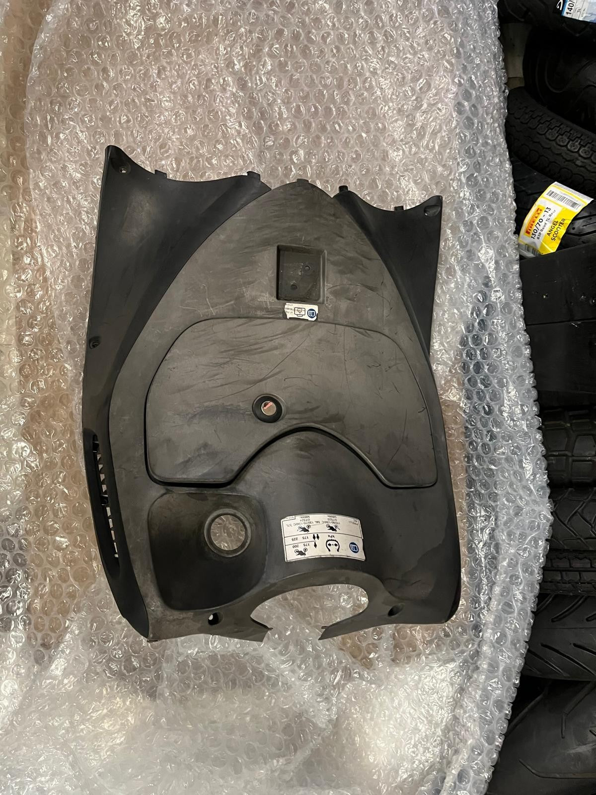 Honda PES 125 Inner Leg Shield Cover | 81131-KTZ