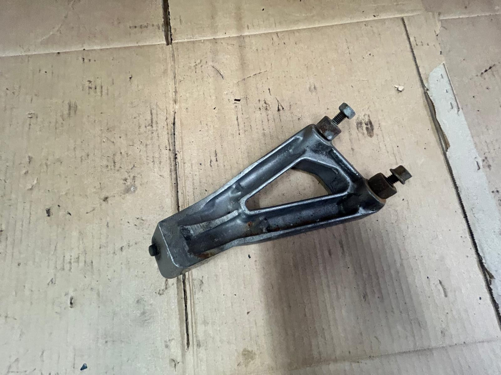 Suzuki GSF Bandit Left Passenger Footrest Bracket