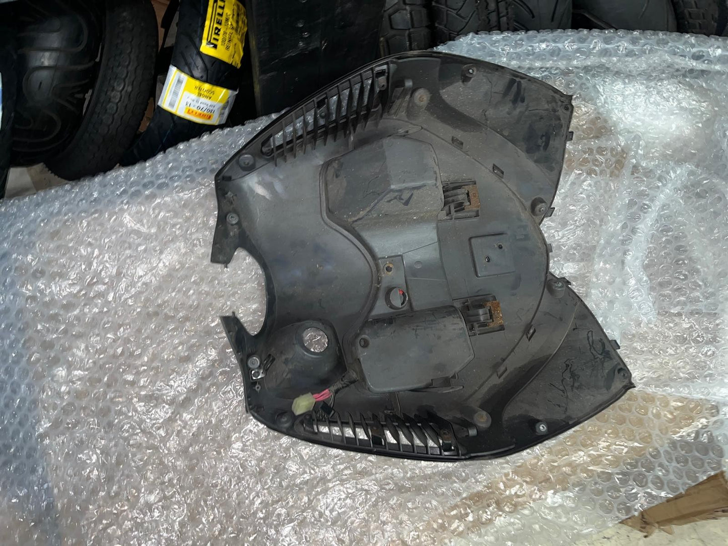 Honda PES 125 Inner Leg Shield Cover | 81131-KTZ